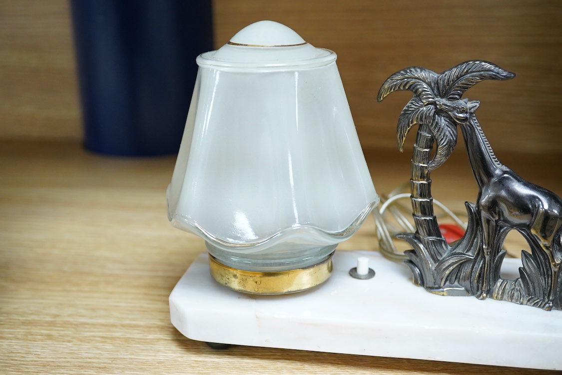 An Art Deco lamp with opaque glass shade, surmounted with a giraffe, 20cm wide